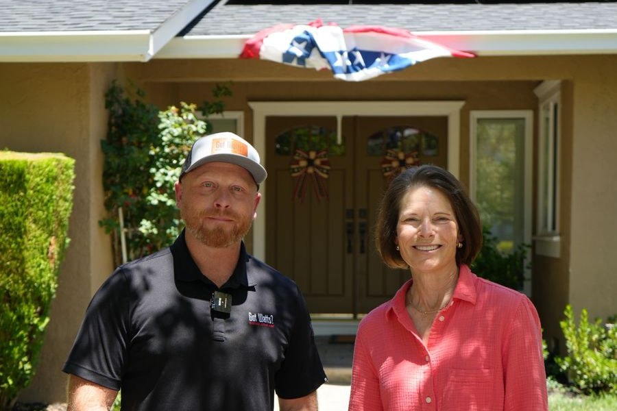 Got Watts founder Jeremy with a happy East Bay homeowner in front of her new solar install